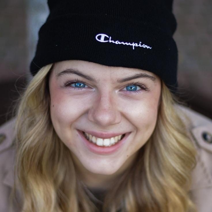 Kaveri Mehta, Lead Design Curator at Mirror Bridge Box, reviewing corporate floral arrangements